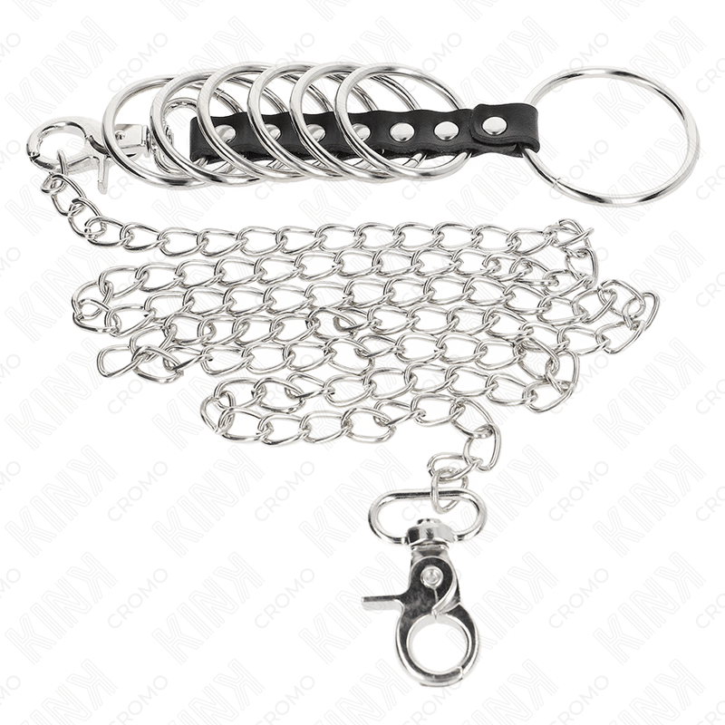 KINK - 7 METAL PENIS RINGS 3.8 CM TO 5 CM CONNECTED WITH LEATHER AND METAL CHAIN 100 CM - Kink&Play