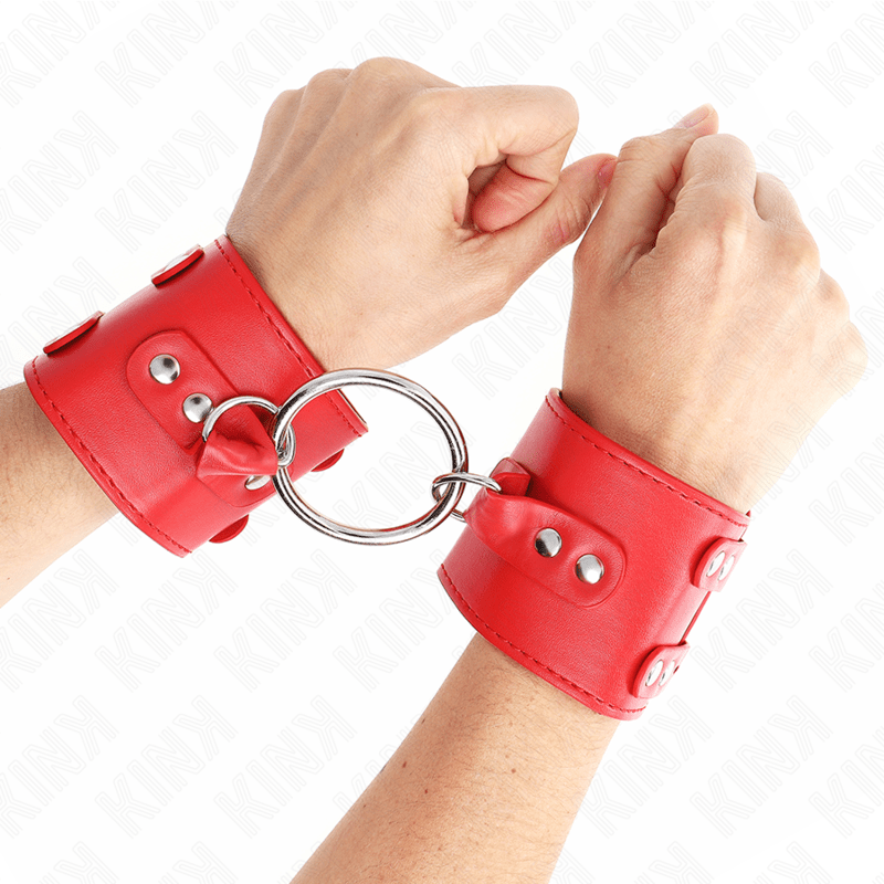 KINK - FIXED WRIST RESTRAINTS WITH RING AND STUDS ADJUSTABLE RED 17 - 22 CM X 6.5 CM - Kink&Play