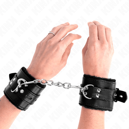 KINK - FUR LINED WRIST RESTRAINTS WITH SQUARE HOLES BLACK AND BLACK BELT ADJUSTABLE 17 - 29 CM X 6 CM - Kink&Play