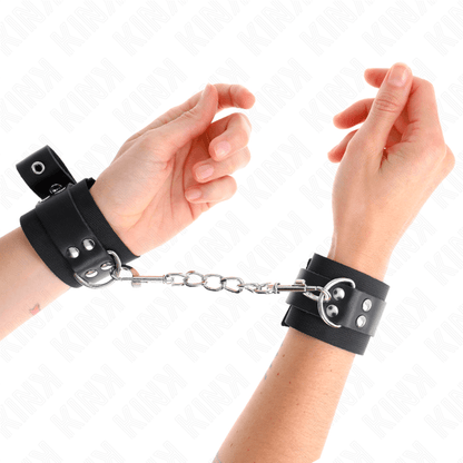 KINK - NYLON WRIST RESTRAINTS BLACK WITH LEATHER BELT BLACK ADJUSTABLE 19 - 29 CM X 5.1 CM - Kink&Play