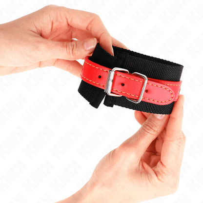 KINK - NYLON WRIST RESTRAINTS BLACK WITH LEATHERETTE RED ADJUSTABLE 19 - 24 CM X 5.5 CM - Kink&Play