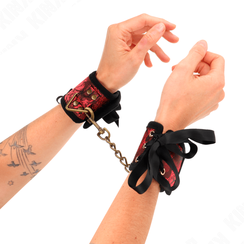 KINK - SCANDAL WRIST RESTRAINTS RED - BLACK LACE DETAILS 24.5 CM X 6.5 CM - Kink&Play