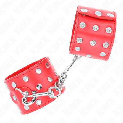 KINK - WRIST RESTRAINTS WITH SNAP FASTEN FULL OF RIVETS RED ADJUSTABLE 19 - 24 CM X 5.5 CM - Kink&Play